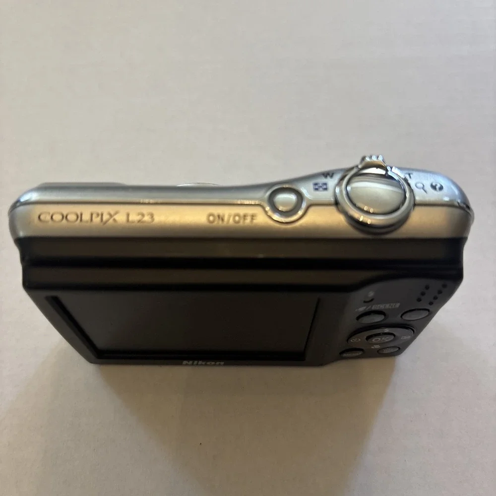 Nikon CoolPix L23‎ 10.1MP Silver Digital Camera - Parts Only
